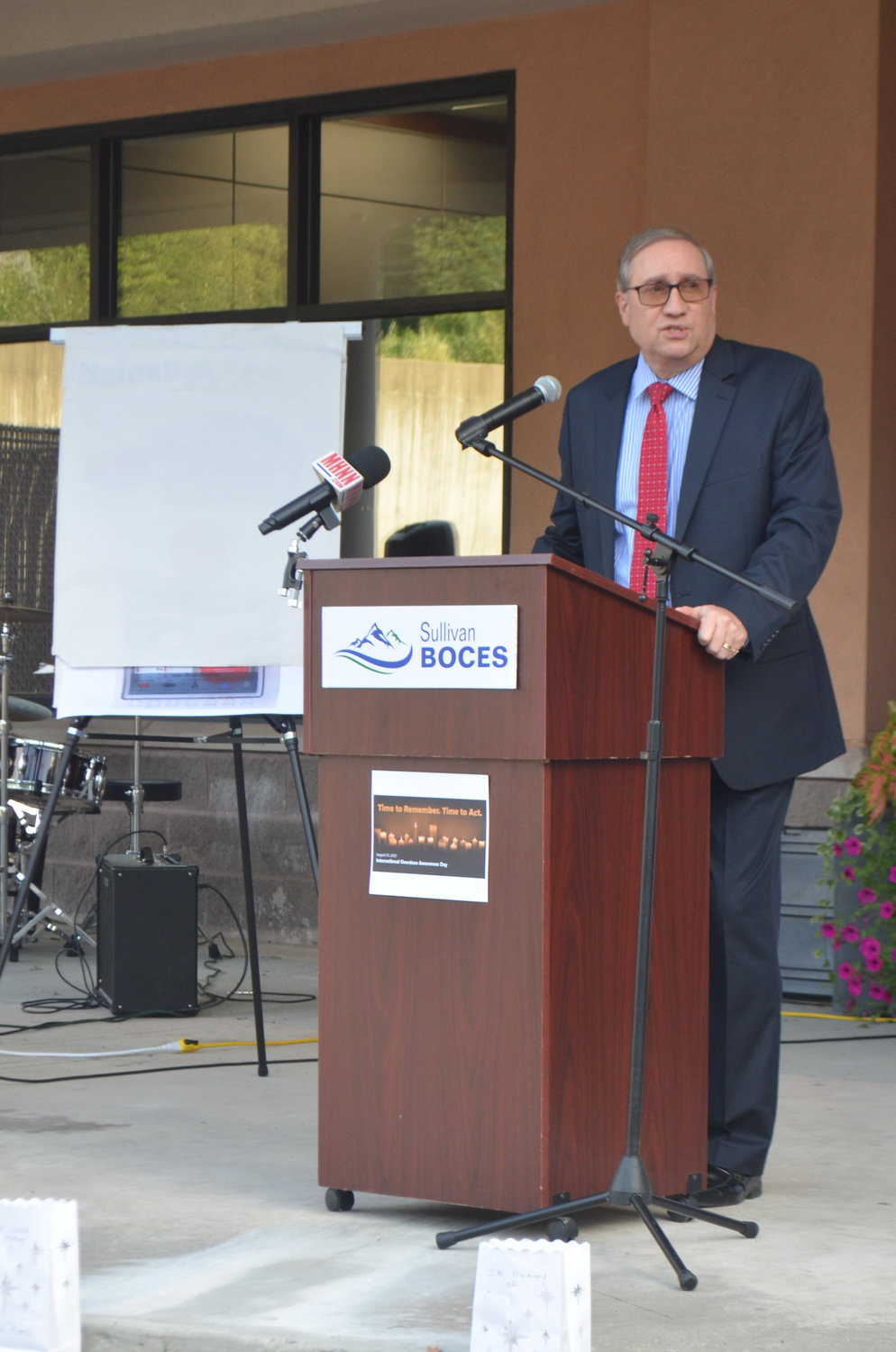 Dr. Robert M. Dufour, the Sullivan BOCES District Superintendent, speaks about the NaloxBox project at the International Overdose Awareness Day vigil.